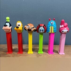 Vintage Assorted pez dispenser lion king bugz Pluto goofy hello kitty my melody